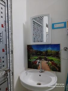 Ένα μπάνιο στο AC Comfort Guest House