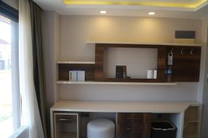 a desk in a room with a window at HK Resort 