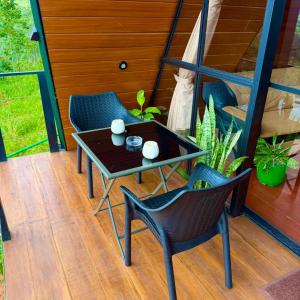 Balkón nebo terasa v ubytování Eco Cabana Bellwood Kandy