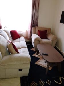 Posezení v ubytování HOMESIDE SERVICED APARTMENTs