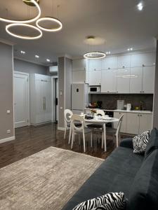 Una cocina o cocineta en ALA APARTS - 4YOU, Amir 34 fotos más