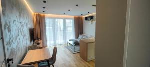 TV a/nebo společenská místnost v ubytování DArt Apartments