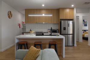 Η κουζίνα ή μικρή κουζίνα στο Urban Pause Retreat - Wollert