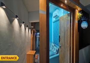 a hallway with a door leading to an entrance at PS Pristine Sea View Vacation Home in Bhīmunipatnam