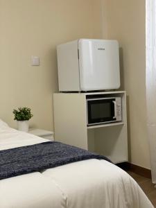 Kuchyň nebo kuchyňský kout v ubytování LOFT Céntrico MALIAÑO - DUA ROOMS
