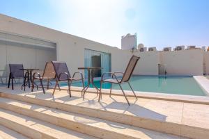 Πισίνα στο ή κοντά στο Royal Palace Compound - Al Mounsiah