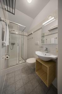 Koupelna v ubytování Residence La Terrazza - Südtirol erleben in Kaltern am See