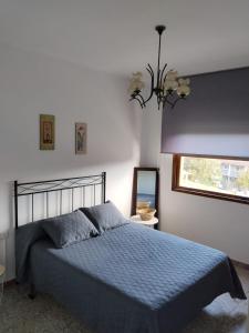 Postel nebo postele na pokoji v ubytování A Niñada