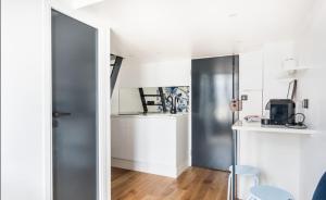 Η κουζίνα ή μικρή κουζίνα στο Grand studio Mezzanine 4personnes