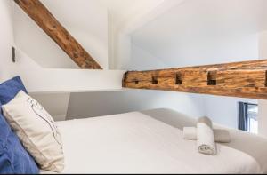 Ένα ή περισσότερα κρεβάτια σε δωμάτιο στο Grand studio Mezzanine 4personnes