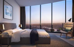 Ένα ή περισσότερα κρεβάτια σε δωμάτιο στο Queens Wharf hosted by AAB