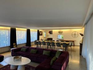 a living room with a couch and a table at Haus Anna in Alpirsbach