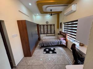 Postel nebo postele na pokoji v ubytování Gilgal House