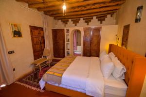Ένα ή περισσότερα κρεβάτια σε δωμάτιο στο Bluegreen Guest House Marrakech +8 φωτογραφίες