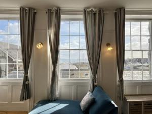 En eller flere senge i et værelse på 1 Cobb House