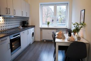 Kuchyň nebo kuchyňský kout v ubytování Moderne City Apartments im Stadtzentrum