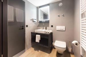 Koupelna v ubytování Hotel Domizil + 10 fotografií