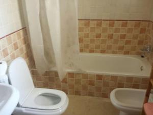 Et badeværelse på Casa María Ronda con parking