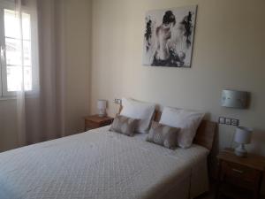 En eller flere senge i et værelse på Casa María Ronda con parking