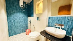 Ένα μπάνιο στο Hotel COCODAN