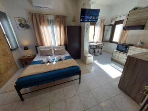 Giường trong phòng chung tại Old town - Fortezza Nest