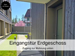 un ingresso di un edificio con la scritta recinti di emergenza di Ferienhausträume-Bodensee Bergstrassen Apartments a Kreuzlingen Altre 49 foto