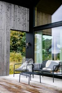 Φωτογραφία από το άλμπουμ του Dream Cabin With Danish Design And Views σε Tjørhom