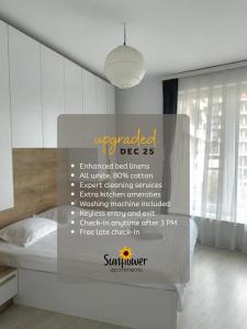 Postel nebo postele na pokoji v ubytování Sunflower Apartments