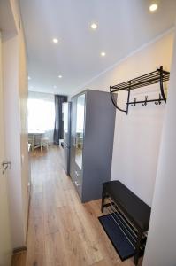 a room with a mirror and a dressing room at Furnished apartment with a very good location in Kristiine in Tallinn