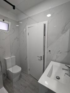 Ένα μπάνιο στο Apartamento Laranjeiras dois +5 φωτογραφίες