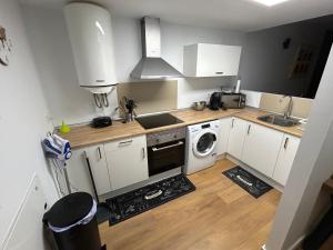 Η κουζίνα ή μικρή κουζίνα στο Canet al Mar Luxe y Confort-Pet Friendly