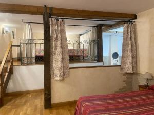 Postel nebo postele na pokoji v ubytování Casa Rural "La Bardena Blanca I "