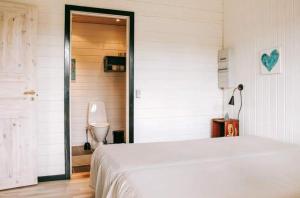 Ένα ή περισσότερα κρεβάτια σε δωμάτιο στο Summerhouse in strandlyst