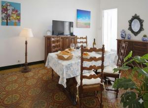 Et tv og/eller underholdning på La terrazza sul porto