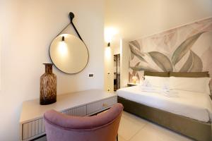 Ένα ή περισσότερα κρεβάτια σε δωμάτιο στο Manu Como Lake Apartment +10 φωτογραφίες