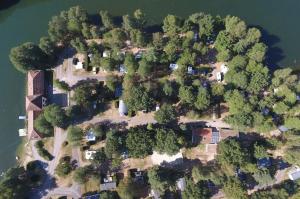 an aerial view of an island in the water at Domaine des Messires-Lodge de Luxe in Laveline-devant-Bruyères