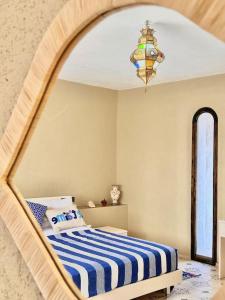 Postel nebo postele na pokoji v ubytování Mogador Suite by Maj Nia - Jardin - Piscine - Luxe - 5 px