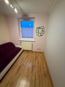 Postel nebo postele na pokoji v ubytování Apartament na Południu