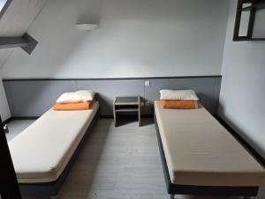 Ένα ή περισσότερα κρεβάτια σε δωμάτιο στο Domaine Du Bois du Loup +33 φωτογραφίες