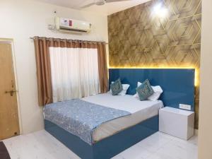 Voodi või voodid majutusasutuse New aashiyana cottage Matheran toas