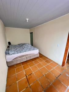 Postel nebo postele na pokoji v ubytování Casa Beira Mar + 2 fotografie