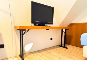 Et tv og/eller underholdning på Hotelkamer voor één persoon in Marx 33-18 + 4 billeder