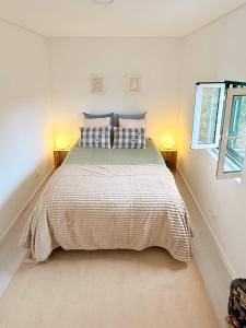 Ένα ή περισσότερα κρεβάτια σε δωμάτιο στο Monte do Garnacho - Villa in the Mountains +26 φωτογραφίες