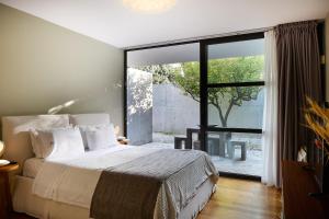 Postel nebo postele na pokoji v ubytování Villa 7