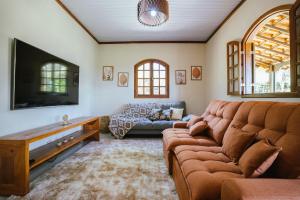 Χώρος καθιστικού στο Carcará Vacation Homes