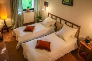 Postel nebo postele na pokoji v ubytování Gîte de plain-pied sans escaliers, Dordogne