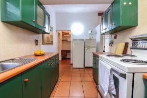 Kuchyň nebo kuchyňský kout v ubytování Die Steenbras