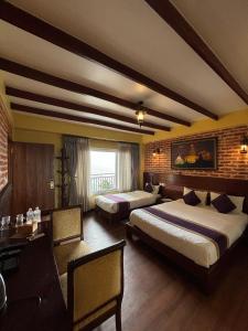 Postel nebo postele na pokoji v ubytování Paradise Villa