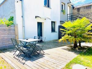 Zahrada ubytování Loft de charme avec parking, jardin et terrasse