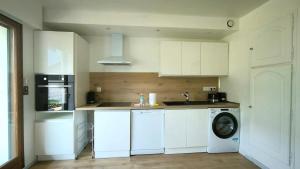 Kuchyň nebo kuchyňský kout v ubytování Appartement Le Bargy + 5 fotografií